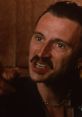 Francis Begbie from Trainspotting displays intense emotion, capturing his volatile nature in a dramatic scene.