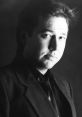 Black and white portrait of Bill Hicks, renowned comedian known for his thought-provoking and often controversial humor.