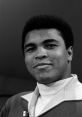 Portrait of Muhammad Ali smiling, showcasing his iconic hairstyle and distinctive fashion in a classic black and white style.