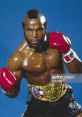 Clubber Lang from Rocky III showcasing his boxing stance, wearing red gloves and a championship belt, exuding confidence.