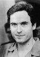 Ted Bundy, notorious serial killer, captured during trial, displaying a chilling smile in a black-and-white photograph.