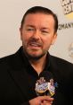 Ricky Gervais speaking at a Comedy Central event, showcasing his signature humor and engaging personality.