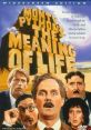 Cover art for Monty Python's Meaning of Life featuring iconic characters in humorous expressions and dramatic poses.