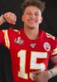 Patrick Mahomes celebrating in a red Kansas City Chiefs jersey, flexing his bicep and showing team spirit.