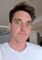 LazarBeam making a funny face in casual attire, showcasing his playful personality and engaging content style.