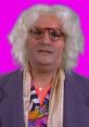 Brian Badonde, a character from Fonejacker, sports a flashy outfit against a vibrant pink background.