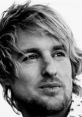 Owen Wilson showcasing his iconic expression, embodying the essence of humor and surprise with his famous saying "Wow".