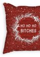 Festive red pillow featuring playful text "Ho Ho Ho Bitches" surrounded by winter-themed greenery and snowflakes.