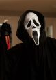 Ghostface from Scream brandishing a bloodied knife, capturing the essence of horror and suspense in the film series.