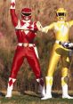 Red and yellow Power Rangers posing together, showcasing their iconic suits and teamwork in a vibrant outdoor setting.