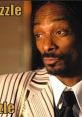 Snoop Dogg famously showcases his signature style, saying "Fo Shizzle Dizzle" in a stylish striped suit.