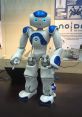 Humanoid robot with blue accents and expressive eyes, showcasing advanced robotics technology and interactive features.