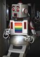 Colorful robot with a rainbow emblem, promoting LGBTQ+ pride and representation in technology and culture.