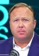 Pocket Alex Jones discusses current events with a serious expression, showcasing his distinct style and commentary focus.