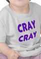 Cute child wearing a gray shirt featuring the text "CRAY CRAY" in bold purple letters, showcasing free funny style.