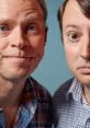 David and Mark from Peep Show, showcasing their signature comedic expressions against a vibrant blue background.