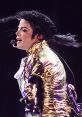 Michael Jackson performing in a striking gold jacket, showcasing his iconic dance moves and captivating stage presence.