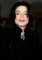 Michael Jackson in a stylish black outfit with pearl accessories, showcasing his iconic look and unique fashion sense.