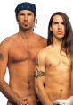 Chad Smith and Anthony Kiedis of the Red Hot Chili Peppers pose confidently, showcasing their unique styles and tattoos.