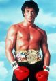 Rocky Balboa, muscular boxer in red gloves, showcasing championship belt against a clear sky backdrop. Iconic sports image.