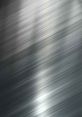 Brushed metal texture with soft silver and gray gradients, ideal for backgrounds and design projects.