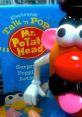 Mr. Potato Head toy with vibrant colors, featuring electronic Talk 'n Pop action in fun packaging. Perfect for kids' playtime!