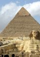 Great Pyramid of Giza and Sphinx under a cloudy sky, showcasing ancient Egypt's remarkable architecture and history.