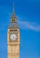 Big Ben tower against a clear blue sky, showcasing its iconic clock face, Gothic architecture, and beautiful details.