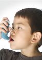 Child using an inhaler to assist with breathing and manage asthma symptoms effectively.