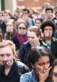 Crowd of 6000 protesters with dollar bill masks, expressing silence and discontent during a significant protest meeting.