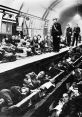 Londoners sheltering in a subway during WWII air raids, showcasing resilience and community under wartime adversity.