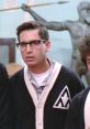 Nerdy character from "Revenge of The Nerds" in a cardigan, showcasing the film's iconic nerd culture and comedy themes.