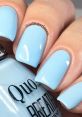 Soft baby blue nail polish with glossy finish, perfect for a fresh morning look. Ideal for any spring or summer style.