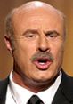 Dr. Phil passionately speaking during a broadcast, showcasing his signature demeanor and engagement with the audience.