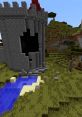 Minecraft castle structure with a skull design near a river and grassy terrain, showcasing creative building ideas.