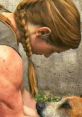 Abby from The Last of Us Part 2 interacting tenderly with a dog, showcasing her caring nature and emotional depth.