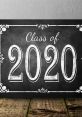 Chalkboard design featuring 'Class of 2020' in elegant typography, perfect for graduation celebrations and announcements.