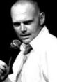 Bill Burr performing stand-up comedy, showcasing his signature style and engaging the audience with humor.