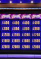 Jeopardy! game board showcasing dollar amounts for categories in a virtual gameshow format. Exciting quiz experience.