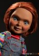 Chucky doll with red hair and blue eyes, wearing 'Good Guys' overalls, perfect for horror collectors and Ahh B fans.