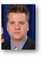 Headshot of a Springfield PD officer, highlighting the department's commitment to public safety and community trust.