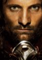 Intense close-up of Aragorn, the heroic character from "The Lord of the Rings," holding his iconic sword.