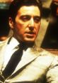 Al Pacino in a classic scene, showcasing his iconic style and intense expression, embodying cinematic brilliance.