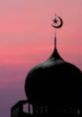 Silhouette of a mosque dome with crescent moon against a vibrant pink sunset, symbolizing Ramadan and Islamic faith.