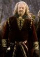 Theoden, King of Rohan, stands resolutely in regal attire, embodying leadership and courage in Middle-earth's epic saga.