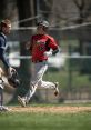 Panther Baseball player wearing jersey number 8 runs the bases during a game, showcasing team spirit and athleticism.