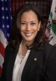 Kamala Harris smiling in formal attire, showcasing leadership beside the American and California flags.