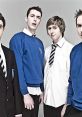 Four teenage boys in school attire from "The Inbetweeners," showcasing their unique styles and expressions.