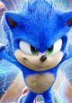 Dynamic Sonic the Hedgehog with vibrant blue fur and intense green eyes, exuding energy and speed in a dynamic action scene.