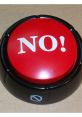 Red "NO!" button with black base, perfect for adding humor and decisiveness to any discussion or decision-making process.